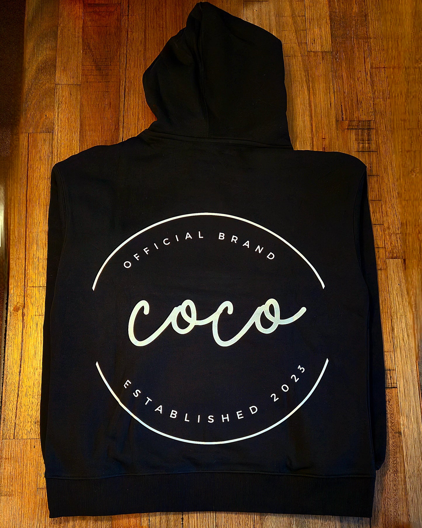 Official COCO Merch - Glowing Logo Hoodie